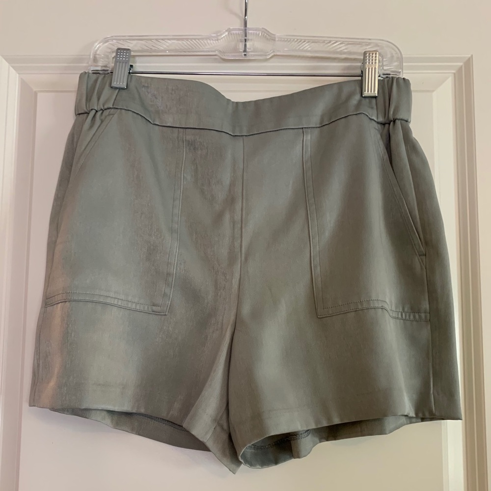 Gray satin shorts.